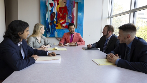 RLA Associates working around conference table