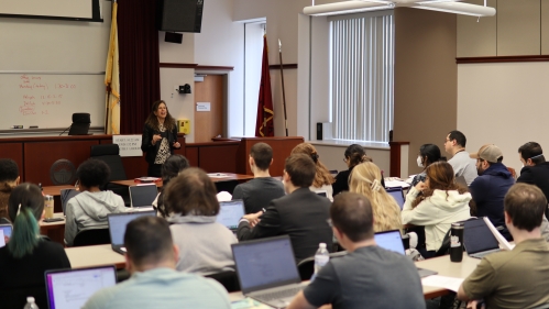Large class with professor teaching at the front
