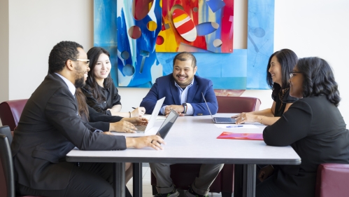 A Rutgers Law student meets with visitors to campus.