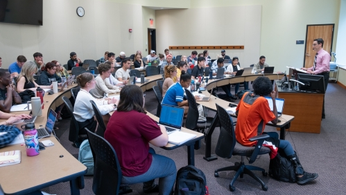 students seated in large classroom
