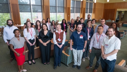 Group of part-time students on the Camden law school bridge.