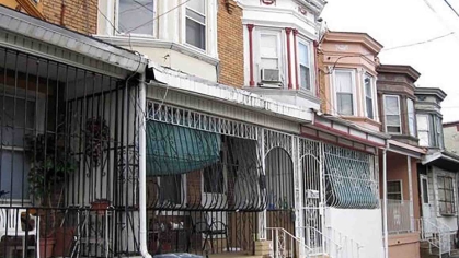 Gated rowhomes on street