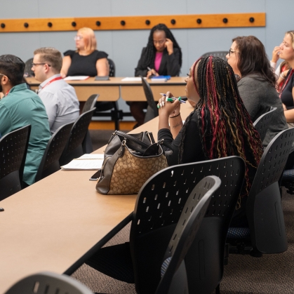 Group of people seated in class