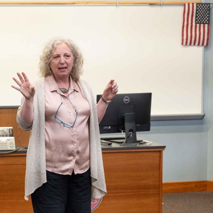 Professor teaching in front of class