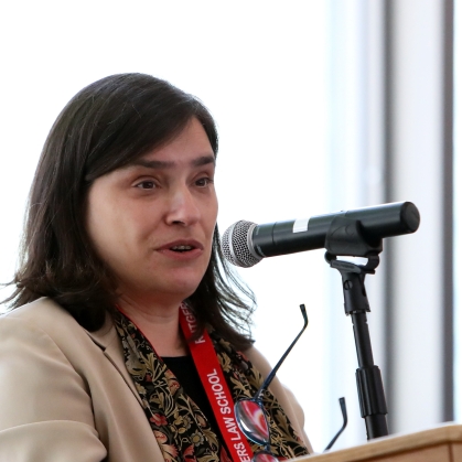 woman speaking at podium