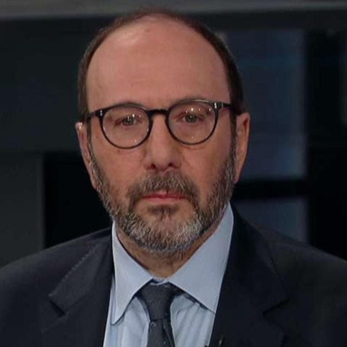 a man with a beard and glasses