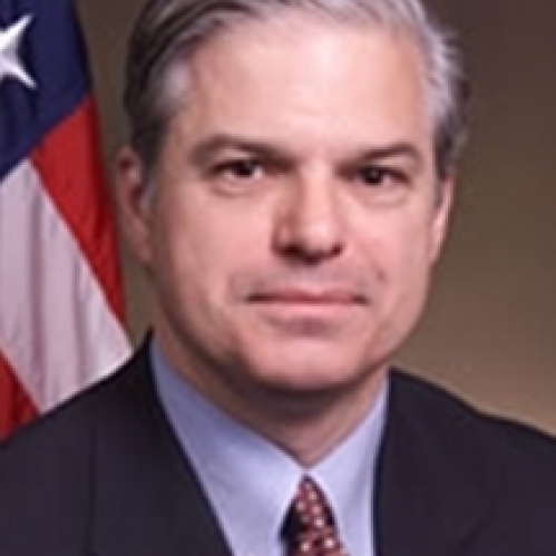 a man with a serious face