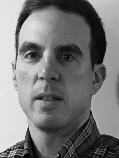 a man with a serious face