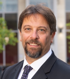 man in suit smiling